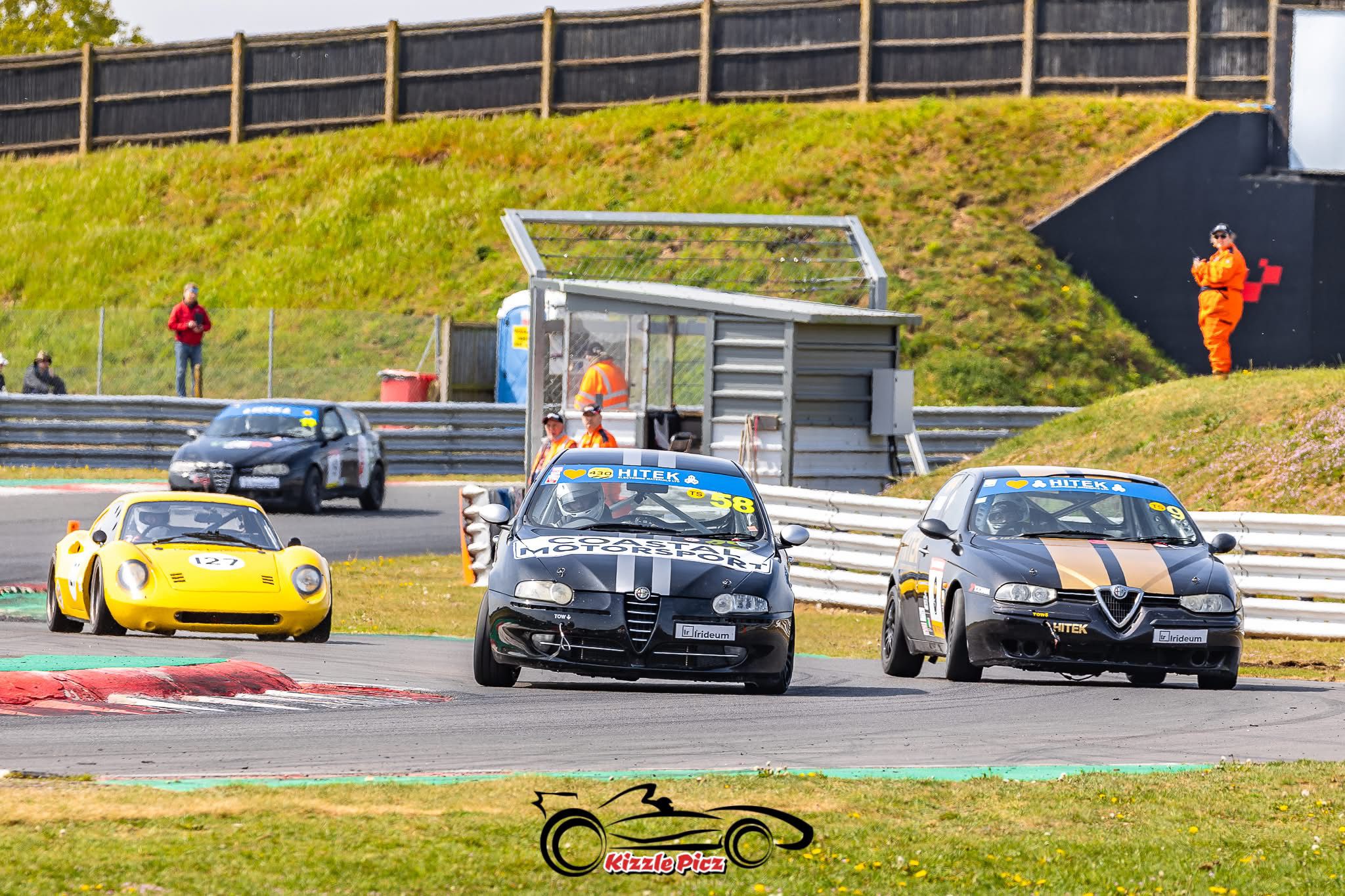 Coastal Motorsport Alfa Romeos racing in a pack
